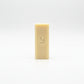 Stain stick bar with 'Mama Suds' branding leaf logo stamp on a white background.