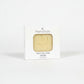 MamaSuds Solid Dish Soap bar in outer paper-based packaging in a white background. 