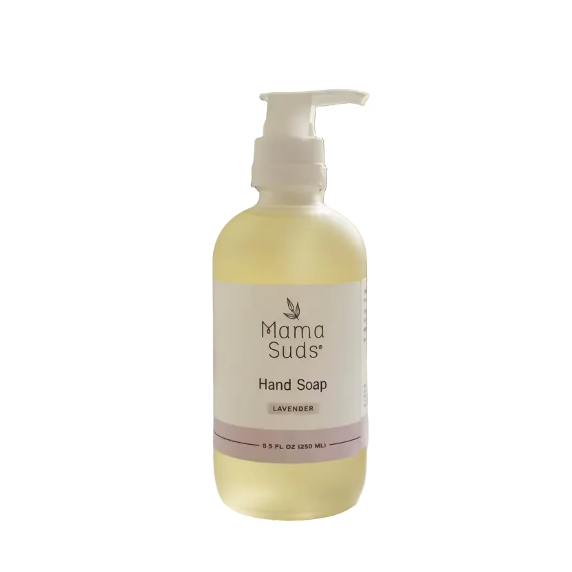 Mama Suds hand soap bottle on a marble surface with white background