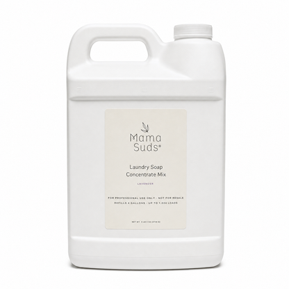A large white plastic jug of Mama Suds Laundry Soap Concentrate Mix in lavender, featuring a clean white label with black text, set against a plain white background.