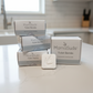 MamaSuds Toilet Bombs packaging on and tab on a kitchen counter.